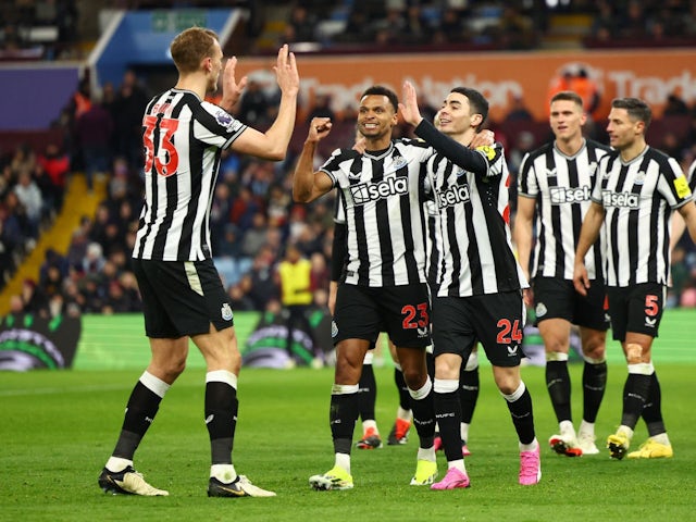 Newcastle United's Jacob Murphy celebrates with teammates after Aston Villa's Alex Moreno scored an own goal on January 30, 2024