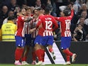 Atletico Madrid's Marcos Llorente celebrates scoring against Real Madrid on February 4, 2024