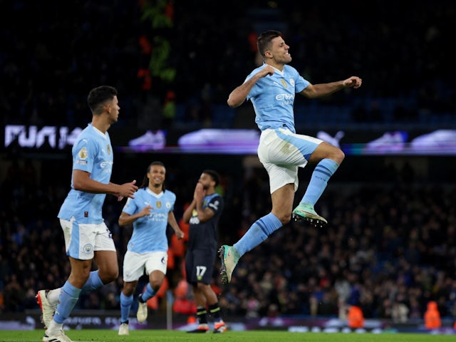 Manchester City's Rodri celebrates scoring their third goal on January 31, 2024