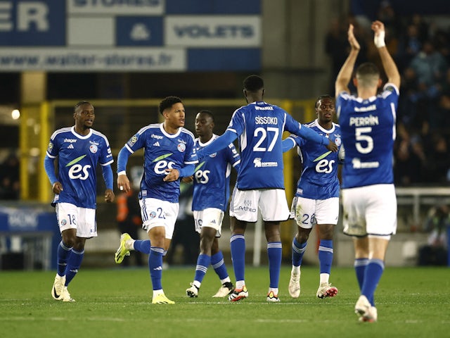 Strasbourg's Dilane Bakwa celebrates scoring their first goal with teammates on February 2, 2024