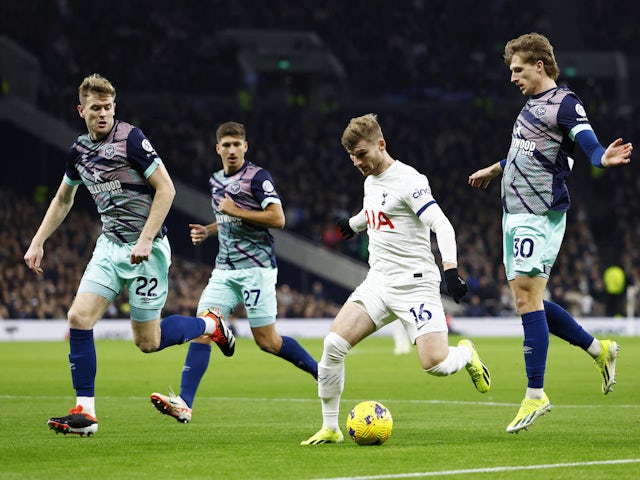 Tottenham Hotspur's Timo Werner in action with Brentford's Nathan Collins and Mads Roerslev on January 31, 2024
