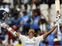 India's Yashasvi Jaiswal celebrates hitting a century against England on February 2, 2024.