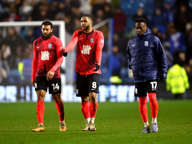 Birmingham City's Tyler Roberts and teammates look dejected after the match on February 9, 2024