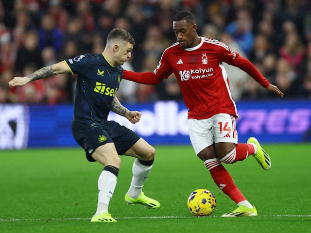 Newcastle United's Kieran Trippier in action with Nottingham Forest's Callum Hudson-Odoi on February 10, 2024
