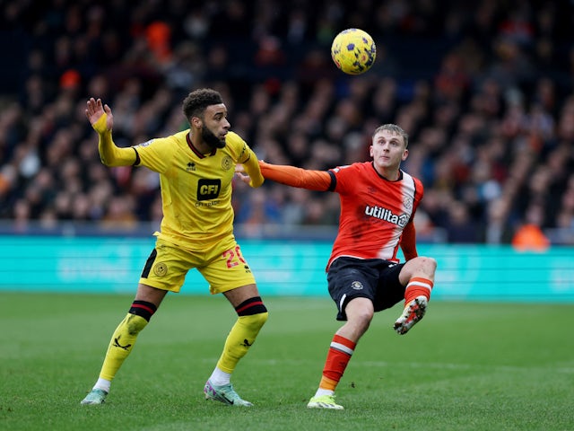 Sheffield United's Jayden Bogle in action with Luton Town's Alfie Doughty on February 10, 2024