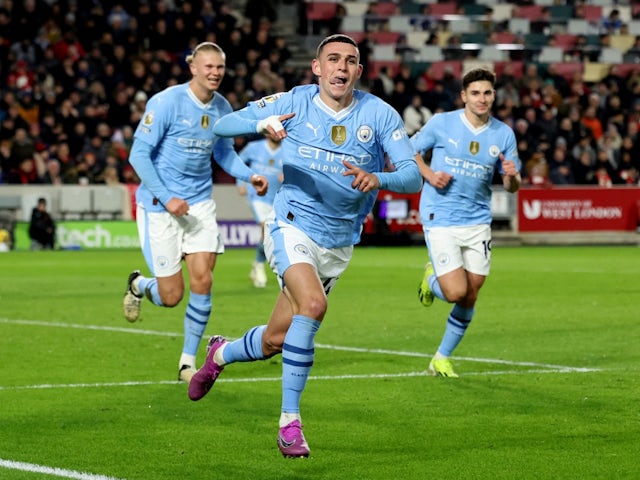 Manchester City's Phil Foden celebrates scoring their second goal with Erling Haaland and Julian Alvarez on February 5, 2024