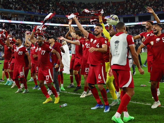 Qatar players celebrate after reaching the AFC Asian Cup final on February 7, 2024