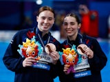 Britain's Scarlett Mew Jensen and Yasmin Harper celebrate after winning the bronze medal on February 7, 2024