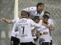 Vitoria Guimaraes' Tiago Silva celebrates scoring their first goal with teammates on February 11, 2024
