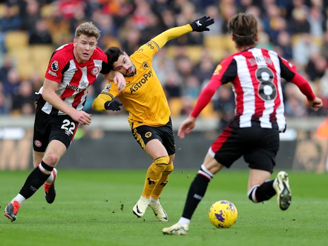 Brentford's Nathan Collins in action with Wolverhampton Wanderers' Pedro Neto on February 10, 2024