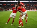 Benfica's Angel Di Maria celebrates scoring their second goal with teammates on February 15, 2024