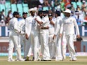 India celebrate taking an England wicket in the third Test on February 17, 2024.