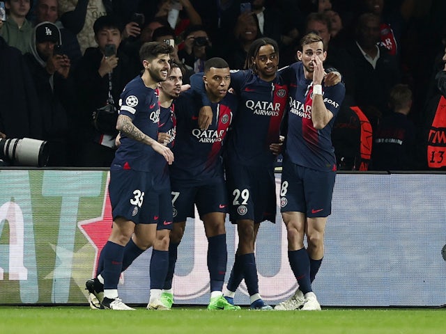 Paris Saint-Germain's Kylian Mbappe celebrates scoring against Real Sociedad on February 14, 2024
