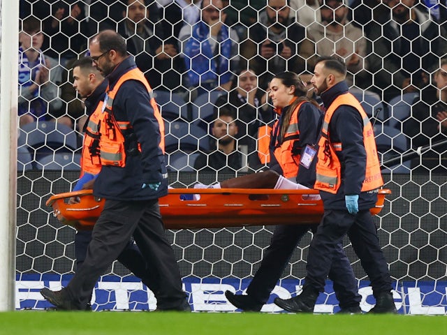 Porto's Zaidu Sanusi is stretchered off after sustaining an injury on February 17, 2024