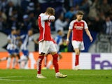 Arsenal's Martin Odegaard reacts after FC Porto's Galeno scored their first goal on February 21, 2024