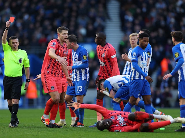Brighton & Hove Albion's Billy Gilmour is shown a red card by referee Tony Harrington on February 24, 2024