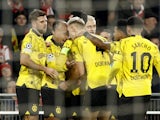 Borussia Dortmund's Donyell Malen celebrates scoring their first goal with teammates on February 20, 2024