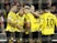 Borussia Dortmund's Donyell Malen celebrates scoring their first goal with teammates on February 20, 2024