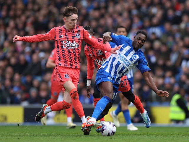 Everton's James Garner in action with Brighton & Hove Albion's Danny Welbeck on February 24, 2024