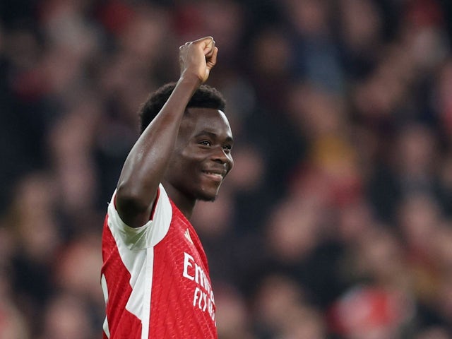 Arsenal's Bukayo Saka celebrates scoring their third goal on February 24, 2024