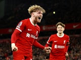 Liverpool's Harvey Elliott celebrates scoring their fourth goal with James McConnell on February 21, 2024