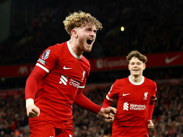 Liverpool's Harvey Elliott celebrates scoring their fourth goal with James McConnell on February 21, 2024