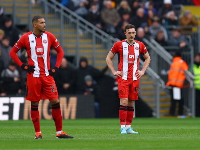 Sheffield United's Vini Souza and Jack Robinson looks dejected after Wolverhampton Wanderers' first goal on February 25, 2024