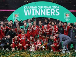 General view of Liverpool players and staff celebrating winning the EFL Cup with the trophy on February 25, 2024