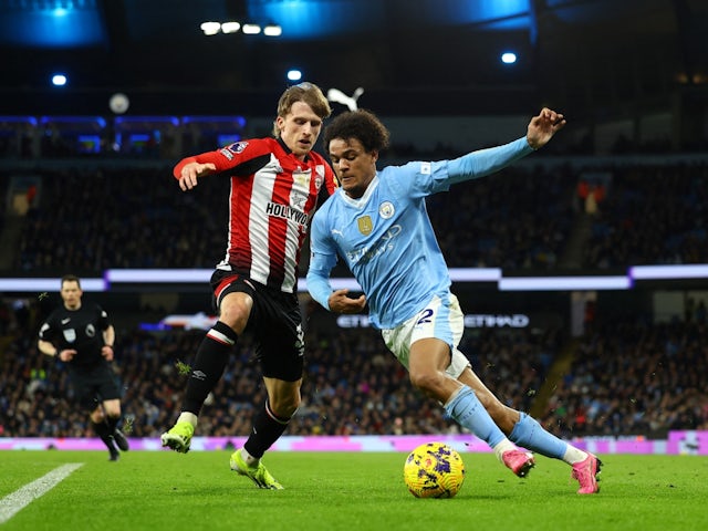 Brentford's Mads Roerslev in action with Manchester City's Oscar Bobb on February 20, 2024