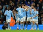 Manchester City's Erling Haaland celebrates scoring their first goal with teammates on February 20, 2024