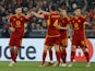 Roma's Lorenzo Pellegrini celebrates scoring their first goal with teammates on February 22, 2024