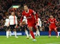 Liverpool's Virgil van Dijk celebrates scoring their first goal on February 21, 2024