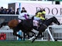 Paul Townend riding Galopin Des Champs in action on their way to winning the 15:30 The Cheltenham Gold Cup ahead of second placed Harry Cobden riding Bravemansgame