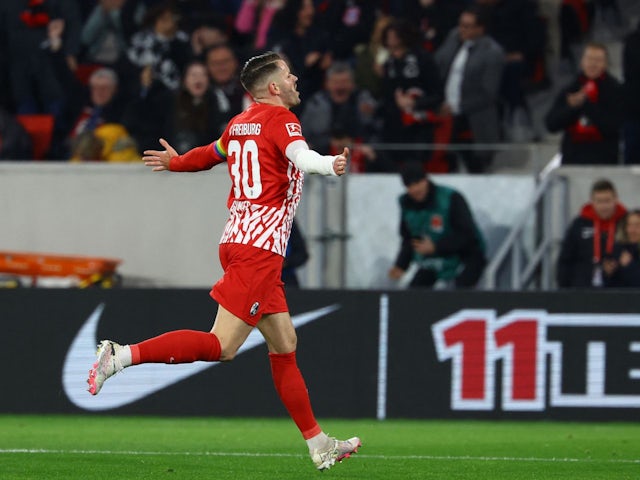 SC Freiburg's Christian Gunter celebrates scoring their first goal on March 1, 2024