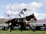 Nico de Boinville celebrates on Constitution Hill after winning the 15:30 The Unibet Champion Hurdle Challenge Trophy