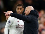 Manchester United manager Erik ten Hag gives instructions to Marcus Rashford on December 17, 2023