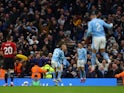 Manchester City's Erling Haaland celebrates scoring their third goal with Phil Foden and Bernardo Silva on March 3, 2024