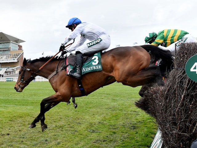 Hitman ridden by Harry Cobden clears a fence during the 1:45 SSS Super Alloys Manifesto Novices' Chase Pool in 2023