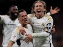 Real Madrid's Luka Modric celebrates scoring their first goal with Lucas Vazquez on February 25, 2024
