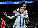 Real Sociedad's Mikel Oyarzabal celebrates scoring their first goal with Takefusa Kubo on February 27, 2024