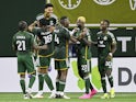 Portland Timbers players celebrate after a goal on February 25, 2024