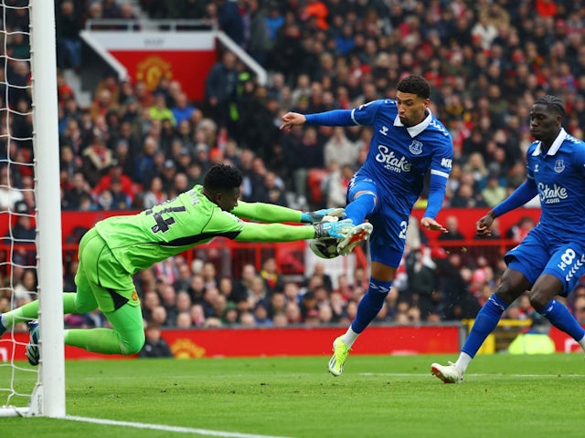 Manchester United's Andre Onana saves from Everton's Ben Godfrey on March 9, 2024