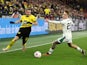 Borussia Dortmund's Julian Ryerson in action with Borussia Moenchengladbach's Luca Netz on March 6, 2024