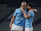 Manchester City's Erling Haaland and Ruben Dias celebrate after winning the Champions League on June 11, 2023
