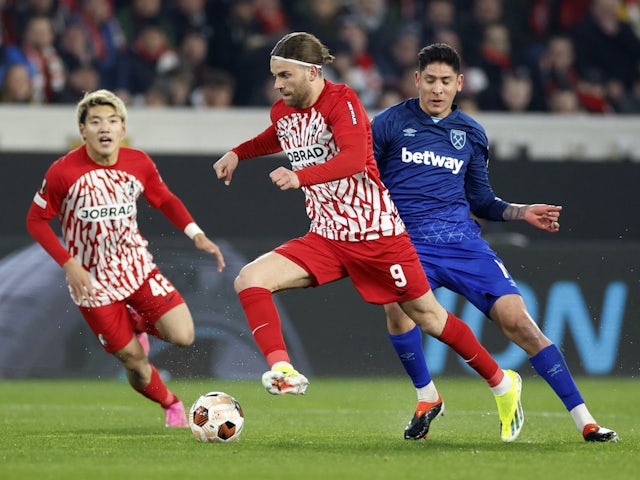 Freiburg's Lucas Holer in action with West Ham United's Edson Alvarez on March 7, 2024
