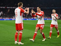 Bayern Munich's Harry Kane celebrates scoring with Jamal Musiala on March 5, 2024