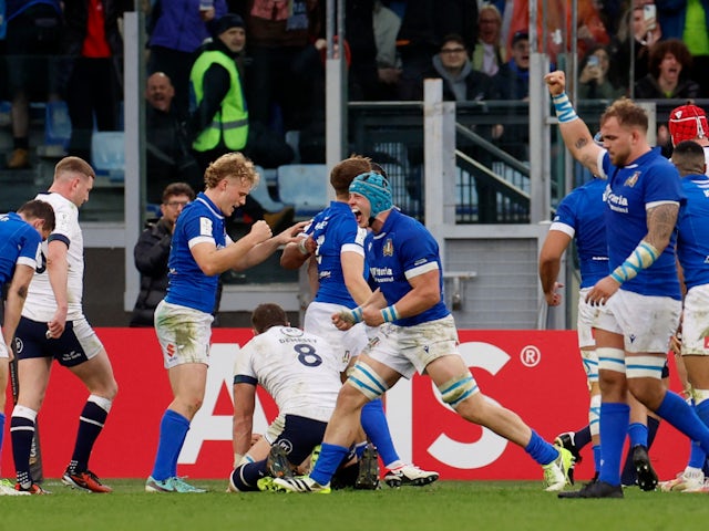 Italy's Stephen Varney celebrates scoring their third try on March 9, 2024