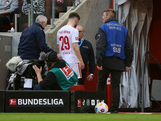 Koln's Jan Thielmann leaves the pitch after being sent off on March 3, 2024