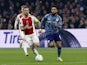 Ajax Amsterdam's Jordan Henderson in action with Aston Villa's Douglas Luiz on March 7, 2024