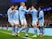 Manchester City's Julian Alvarez celebrates scoring with teammates on March 6, 2024